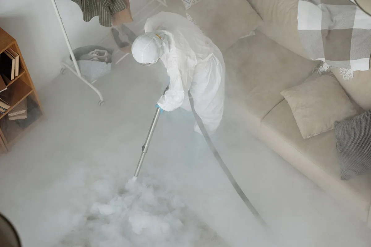Biohazard cleanup technician in protective equipment, Baton Rouge, LA